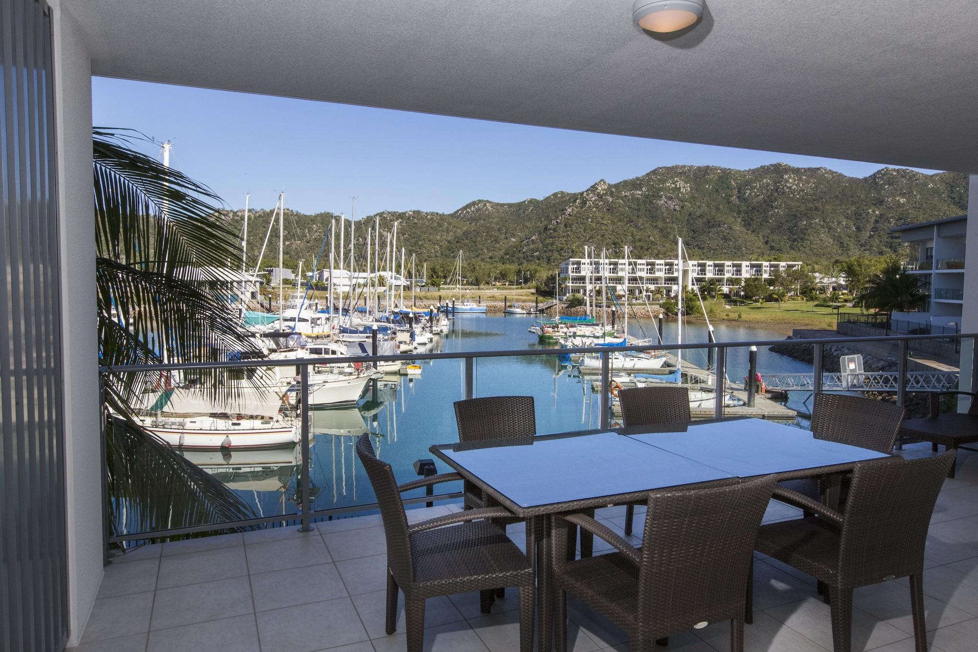 Peppers Blue On Blue Hotel Nelly Bay Exterior foto View of the marina from a private balcony